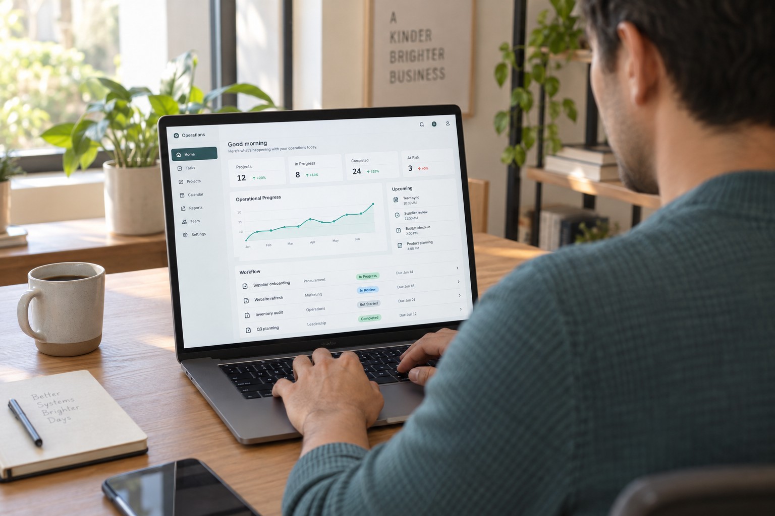 Over-the-shoulder view of an operations manager using a custom business application